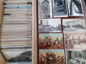 A quantity of mixed worldwide postcards in 2 wooden boxes, mainly mid 20th Century to include