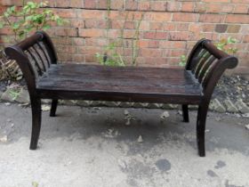 A modern stained teak finished bench with a slatted seat, Location: