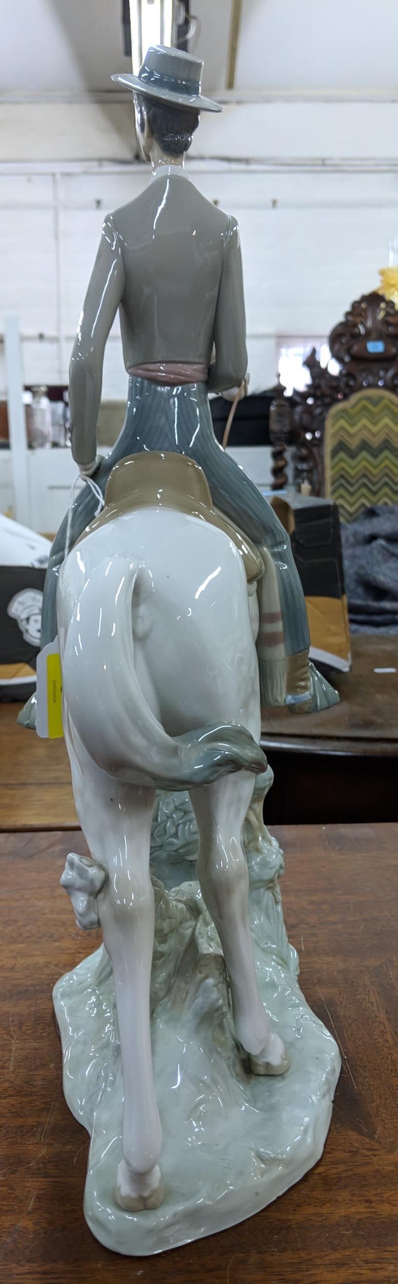 A Lladro figure of an elegant man in smart dress on horseback, Location: - Image 7 of 12