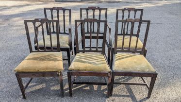 A set of four George III mahogany dining chairs and two matching carvers A/F Location: