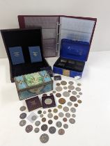 Numismatic Interest - A coin collection album, presentation case, cash tin, along with a mixed group