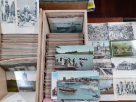 A quantity of early to mid 20th century postcards to include Wales, Canada, Bangalore, India and