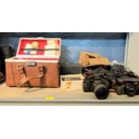 Photographic equipment to include a Praktica B100, A Cannon AE-1, a Holga 200m lens and other items,