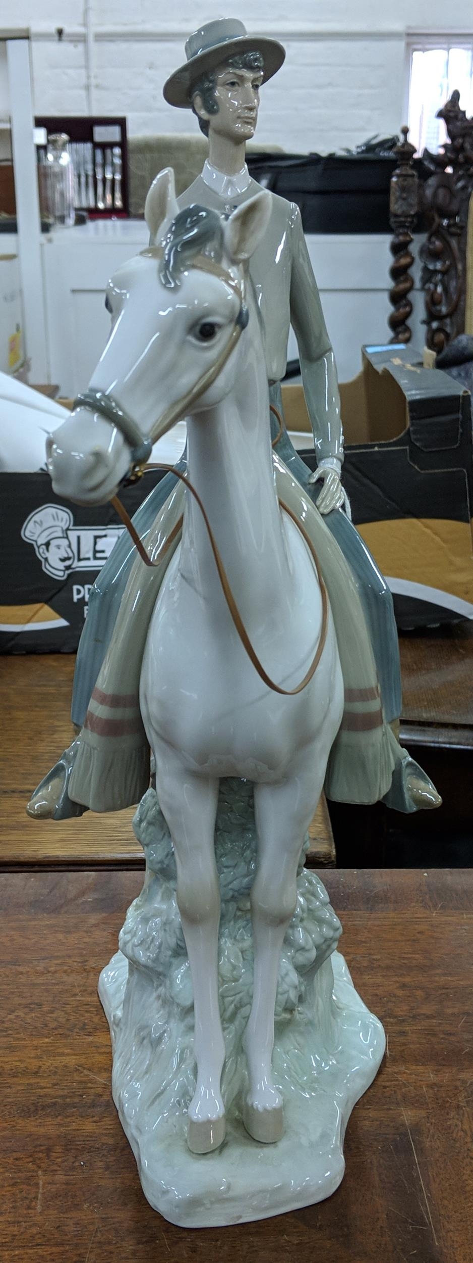 A Lladro figure of an elegant man in smart dress on horseback, Location: - Image 3 of 12