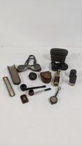 A mixed lot to include an early 20th century combined emergency compass, along with a pair of