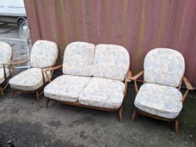 A mid 20th century Ercol two seater sofa and two matching armchairs, Location: Blue Con