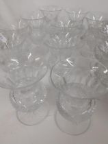 A set of 12 thistle formed crystal wine glasses. Location:R2.3