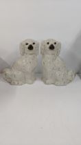 A pair of 19th century Staffordshire spaniels, 30cm h, Location: