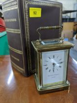 Matthew Norman brass cased five window carriage clock, with key and case, Location: