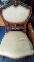 A circa 1900 French oak carved side chair A/F, together with a walnut x-framed stool Location: RAF