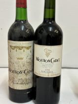 1 bottle of Mouton Cadet 2004 Bordeaux A bottle of Mouton Cadet 1980 Bordeaux Location: