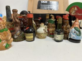 Twenty three miscellaneous miniatures to include Cherry Brandy, Tia Maria and Cointreau Location: