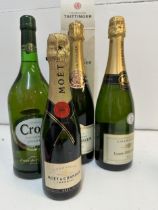 1 bottle of Taittinger Champagne, 1 bottle of Louis Delaunay Champagne, 1 bottle of Moet & Cahndon