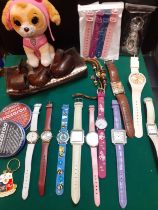 A large quantity of modern watches and costume jewellery to include necklaces, earrings and