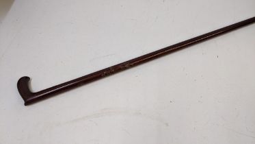 A Chinese white and yellow metal inlaid walking stick Location: