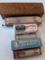 Three vintage Hohner harmonicas to include 2 Hohner Marine Band examples and a Hohner 64 Chronomica.