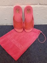 Louis Vuitton-A pair of pink monogram rubber slider mules, European size 38 with pink branded