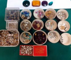 A quantity of jewellery beads and crystals to include faceted glass stones all housed in a small