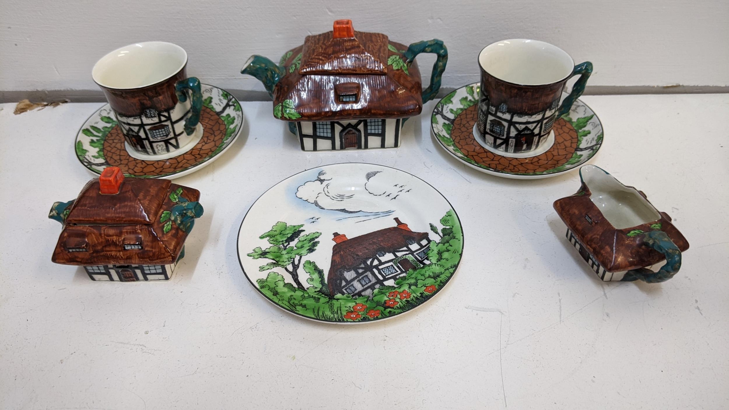 A John Maddock cottage style part tea set with a teapot, sugar, cream plates and cups (8) Location: