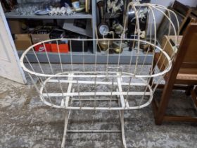 An early 20th century white painted wrought iron cot Location: