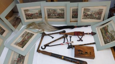 Twelve early 20th century hunting prints, tribal artifacts, an olive wood box and a 19th century
