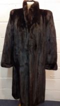 A late 20th Century French Fourrures de Nord black glossy mink coat 40" chest x 44" long with