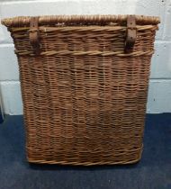 A vintage laundry basket with leather straps, 60" high, 52"wide x 45" deep. Location:RAB
