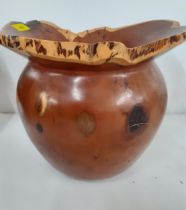 A Terry Harvey hand turned yew planter dated 1996 with label and carved insignia to the base, 27cm