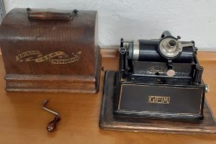 A late 19th Century Edison Gem phonograph, serial number G138499 in oak case. Location:BWR