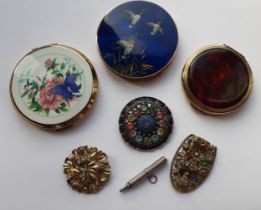 Three vintage compacts to include Stratton and Rigu together with 2 decorative gold tone clips and a