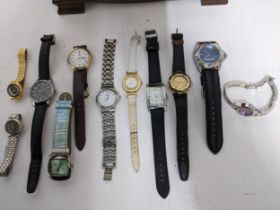 A selection of mainly quartz ladies and gents wrist watches in a two drawer jewellery box to include