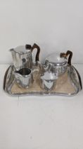 Picquot ware tea set to include a teapot, water jug, sugar bowl, milk jug and tray Location: