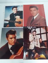 A collection of 4 Elvis Presley colour prints and 3 original 6x6 colour transparencies. Location:1.1