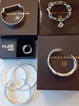 A group of modern silver and silver tone jewellery to include 3 Monica Vinader silver bracelets; one