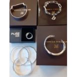 A group of modern silver and silver tone jewellery to include 3 Monica Vinader silver bracelets; one