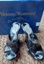 Vivienne Westwood-A pair never worn black rubber wedge VW Melissa shoes, UK size 4 with original