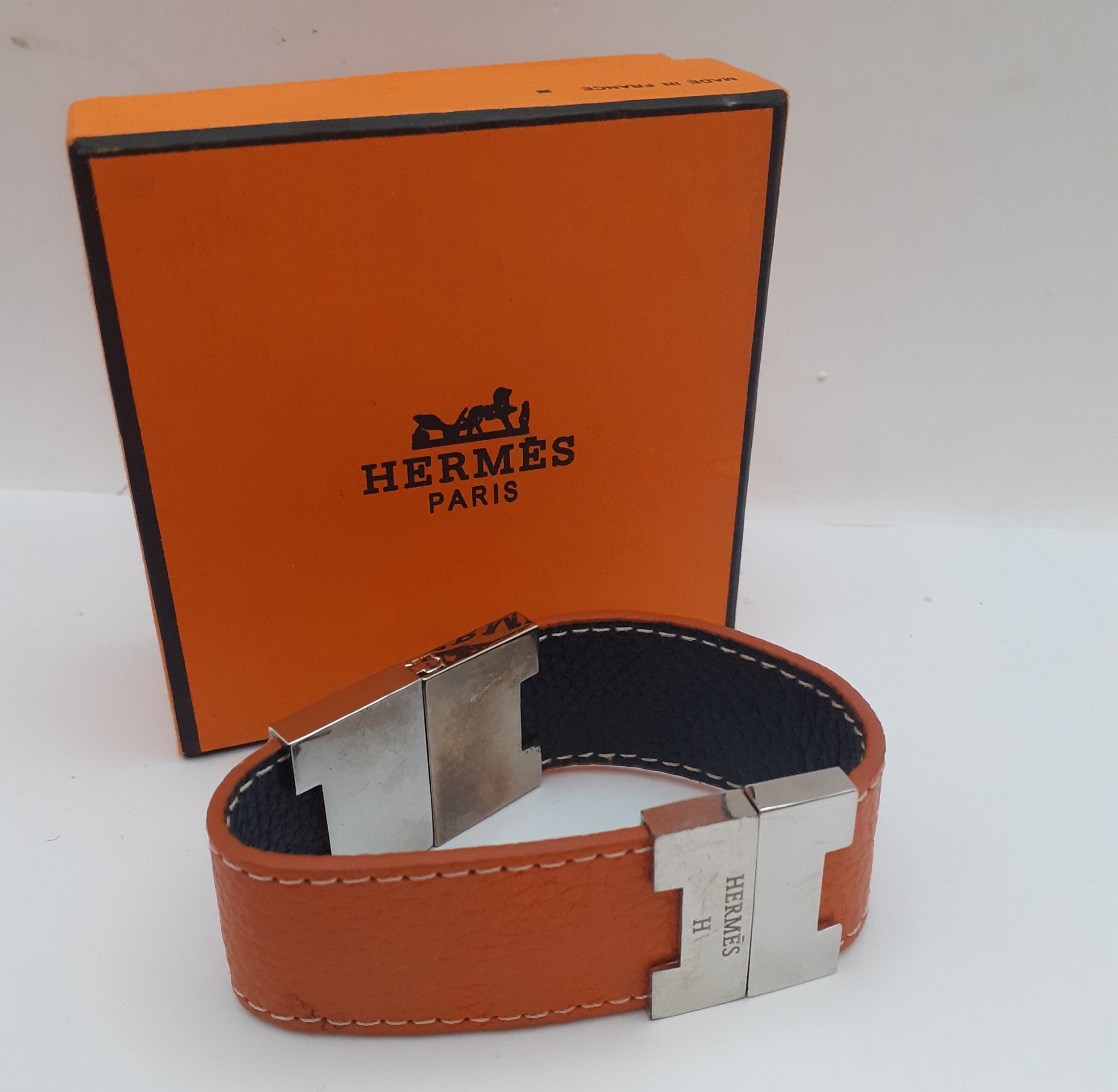 Hermes-A reversible brown and orange leather 'Leurie' wrist strap having silver tone hardware, - Image 3 of 5