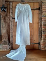 A bespoke 1960's white satin and embroidered wedding gown with train having an Broderie Anglaise