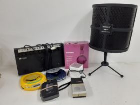 A quantity of music related items to include a Sanyo discman, a Neewer NW-12 Pop Filter Shield and