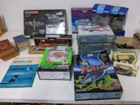 A mixed lot of model aircraft, diecast vehicles and other toys and books to include Observer books