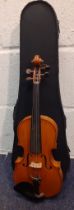A ⅛ size violin, no internal labels, back measurement 26½cm, total length 44cm, no bow, having a