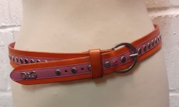 Dolce & Gabbana-An orange and pink D&G belt with silver tone buckle Condition: Slight areas of