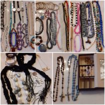 A quantity of 20th Century and later bead necklaces and other items to include a rough cut