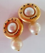 Chanel- A pair of 1994 Autumn Collection gold tone and pearl cufflinks, stamped Chanel 94 P Made