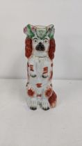 A Victorian Staffordshire begging spaniel dog single handled jug 26.5cmH Location: