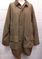 A Hucklecote gents green tweed country pursuit coat having a green felt collar, 2 front deep pockets