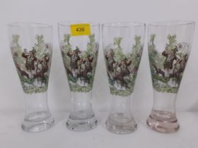 Four Bavarian style enamelled glass beer glasses depicting images of Bavarian huntsmen in