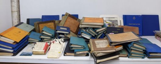 A large quantity of Royal Air Force manuals for flying and air navigation, blank pilot's log book