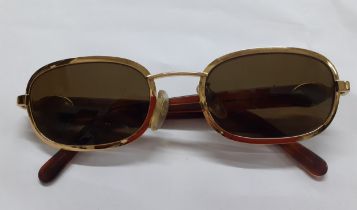 Rochas-A pair of vintage gold tone sunglasses, model 90778 with green lenses and tortoiseshell