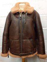 An Irvin gents brown sheepskin and leather RAF Flying jacket, size 44"chest, Large, having a belt to